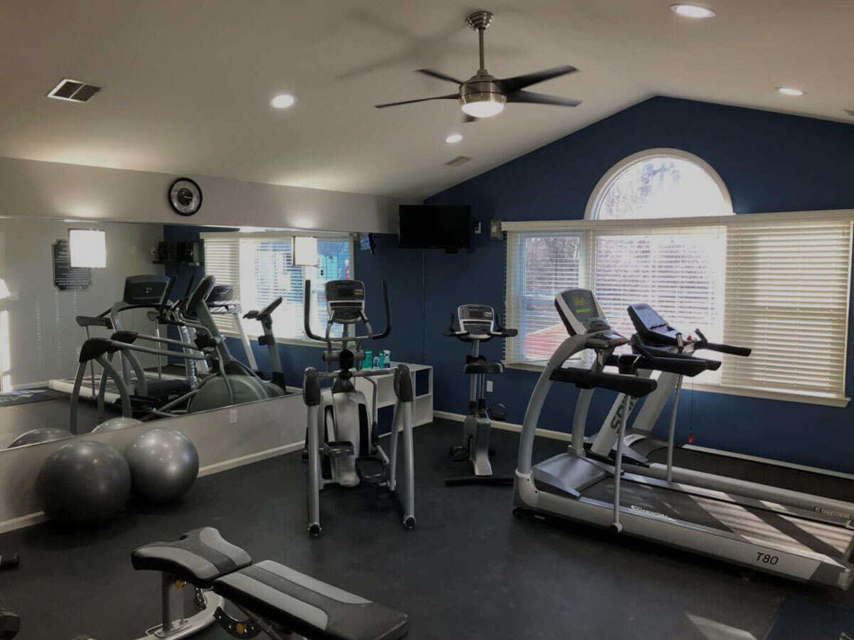 High-quality fitness equipment in the exclusive fitness center amenity at Pointe North apartment rentals